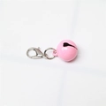 Pink round pet bell with silver lobster clasp and ring connector on white background - Painted Pink