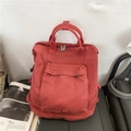 Red washed canvas backpack for women in solid color with large capacity and vintage finish - Red