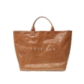 Minimalist brown tote bag with white lettering and a unique crinkled texture finish - Brown