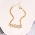 Detail of gold bracelet with colorful cubic zirconia stones on hollow star pendants - Hollow Three Stars Rings (18#)