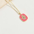 Golden necklace with a rectangular pink Hamsa Hand pendant featuring sparkling rhinestones - Rose Red