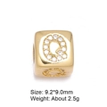 Detailed macro of 8mm gold-plated letter Q bead with micro-pave white zircon stones - Letter Q
