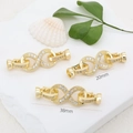 18K gold plated infinity jewelry clasp with white zircons on a natural stone background - Large Infinity / Gold