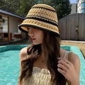 Beige knit bucket hat with black striped trim for summer sun protection fashion - Colored Bucket Hat Beige