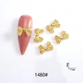 Detailed view of golden 3D metallic bow nail charms showing 8mm x 11mm dimensions - 1480# Gold Textured Bowknot