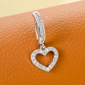 Silver heart navel ring featuring sparkling white cubic zirconia on brown leather - Single Heart Style (Silver)