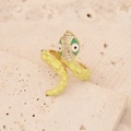 Detailed close-up of a golden snake ring with yellow enamel and sparkling rhinestones - Yellow