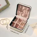 Portable cream white jewelry box for girls featuring green edges and pink suede lining - Beige