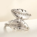 Silver adjustable leaf ring with sparkling zircons on elegant white silk background - Adjustable Open / Steel Color Feather White Zircon