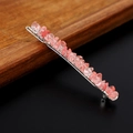 Dettaglio del fermaglio per capelli in filo metallico con cristalli rosa - Quarzo anguria con clip d'argento