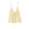 Light yellow spaghetti strap top with V-neckline and button details on white background - XS / Off White