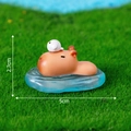 Resin capybara figurine with a white bird, 2.7cm high and 5cm long for desk decor - Swimming Capybara