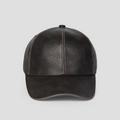Detailed view of the premium black PU leather texture and stitching on the baseball cap - M (56-58cm) / Black