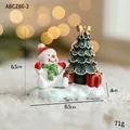 Miniature resin Christmas snowman and tree figurine on snowy base for holiday decor - Tree Snowman