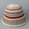 Detailed knit texture of a colorful crochet bucket hat with red and brown stripes - M (56-58cm) / Beige