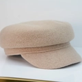Detail view of a beige wool military cap with a stiff brim and retro flat-top design - Adjustable / Off White