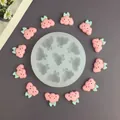 Macro view of 9-cavity silicone mold with pink cloud-shaped crafts and measurements - 9-Hole Cloud Mold