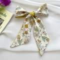 Floral tulip print ribbon hair bow with yellow petals and green leaves on cream fabric - Lemon Yellow Four-petal Flower