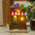 Christmas LED bakery house resin ornament with warm lights and festive snow details - Bakery