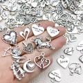 Silver alloy heart and unicorn charms for DIY jewelry making on a white background - Antique Silver Valentine Series (SN1326)