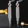 Elegant silver tassel drop earrings with shimmering rhinestones for evening wear - Silver Twisted Shape Tassel (529)