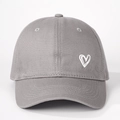 Close-up of heart embroidery on dark grey cotton baseball cap with twill texture - One Size / Gray
