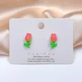 Detail view of tulip earrings with S925 silver needles and pink enamel floral design - Tulip Stud Earrings (11#) / Sunstone