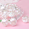 Close-up of DIY acrylic beads with 3D crown charms on a pink background - Transparent Bead + White Crown / 18mm