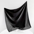 Artistic drape of glossy black satin square scarf showing smooth silk texture and sheen - 90*90cm / Black