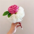 Close-up of hand holding a pink silk rose decorative pen with lace and LED lighting features - Gauze Skirt Imperial Rose / Rose Red