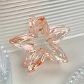 Pince à cheveux étoile en résine translucide avec effet irisé orange et rose doux - Orange