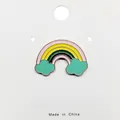 Detailed view of a colorful rainbow enamel brooch with mint green clouds and gold plating - 151*Rainbow Cloud Pink Green Pin