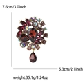 Vintage gold brooch with deep red crystals, AB rhinestones and size measurements - Purple