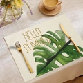 Linen placemat with green monstera leaves and golden Hello Summer print design - Hello Summer Monstera Leaf