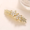 Exquisito clip de pelo dorado con flores y cristales para un estilo elegante de lujo - Estilo de Hoja