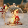 LED glass ball christmas ornament with wooden santa claus and snowy pine tree decor - Santa Claus Round Front View