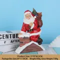Resin Santa Claus sitting on chimney with gift bag, dimensions 21x8x30.5 cm christmas decor - Chimney Climbing Santa