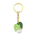 Gold keychain featuring a green monstera plant pendant in white enamel pot - K896 (Single - Monstera Pot)