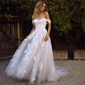 Off-shoulder white wedding dress with lace appliqués and tiered tulle a-line skirt - US 2 / White