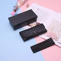 Detail of black woven leather eyeglass case set with gold snap button and packaging box - Black Woven Lanyard Set with Box