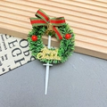 Detail of Christmas cake topper wreath with Merry Christmas gold text and red berries - Wreath-1001