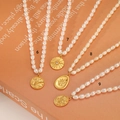 Elegant French style natural freshwater pearl necklace with vintage gold relief pendants - No.7 Sunburst White Zirconia