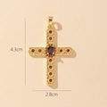 Close-up of gold cross pendant with red crystals showing 4.3cm height and 2.8cm width - Style D-Red Zirconia Cross