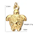 Golden sea turtle pendant with starfish relief and circular bail, size 23x18mm - BXGPJ077-Engraved Sea Turtle Pendant