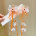 Traditional Chinese hair clips with orange and white tassels for girls Hanfu outfits - Chunxi Orange Flower Butterfly