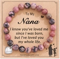 Detail of beaded nana bracelet with rhodonite stones and heart pendant on gift card - Rhodonite + Nana Card