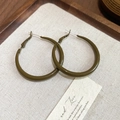 Detailed view of olive green geometric hoop earrings on textured white fabric display - 4cm (Silver Needle) / Olive Green