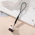 Close-up of Maneki Neko charm with Lucky Fortune kanji on textured stone background - Black Blessing