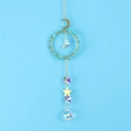 Detail of golden moon and star suncatcher with turquoise stones and crystal prism - Turquoise