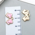 Pink drip oil bow alloy pendant with gold edges and measurement ruler detail - Pink Bow Tie